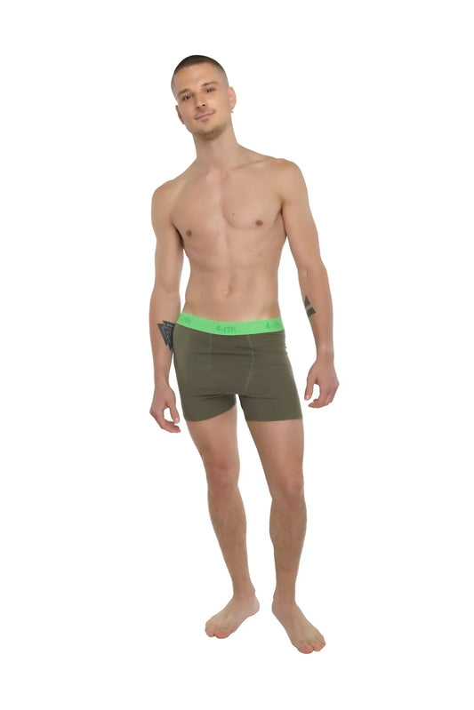 Olive green boxer briefs with bright neon green waistband designed for performance and yoga activities