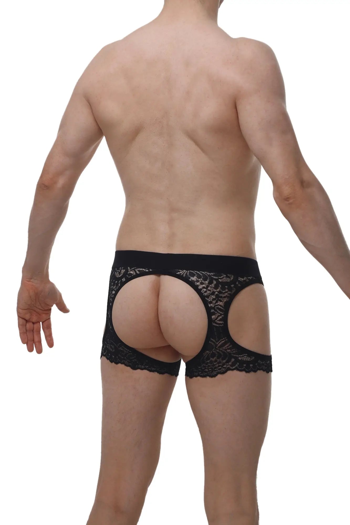Black lace thong with cutout design from petitQ corlier boudoir collection showcasing delicate lace material