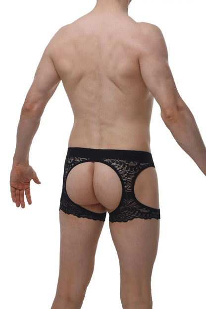 Black lace thong with cutout design from petitQ corlier boudoir collection showcasing delicate lace material