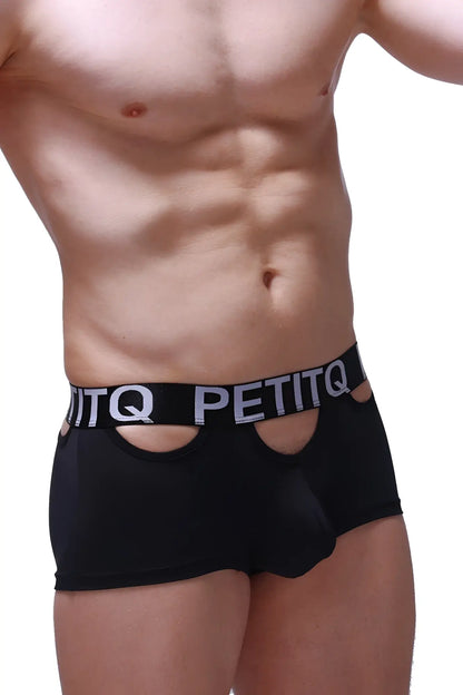 Black petitq boxer briefs with white logo band and cutout details designed for comfortable daily wear