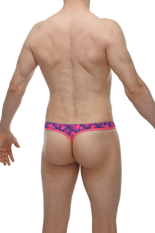 Petitq g-string cleder tropical hearts bright pink and navy blue thong with tropical leaf pattern shown from the back