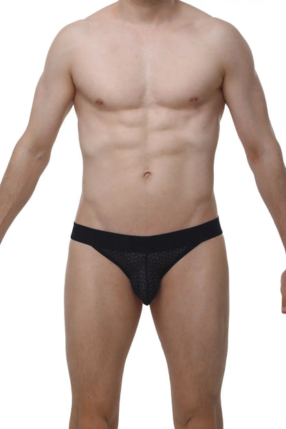 Black lace-trimmed petitq jockstring macra in sheer textured fabric with solid waistband