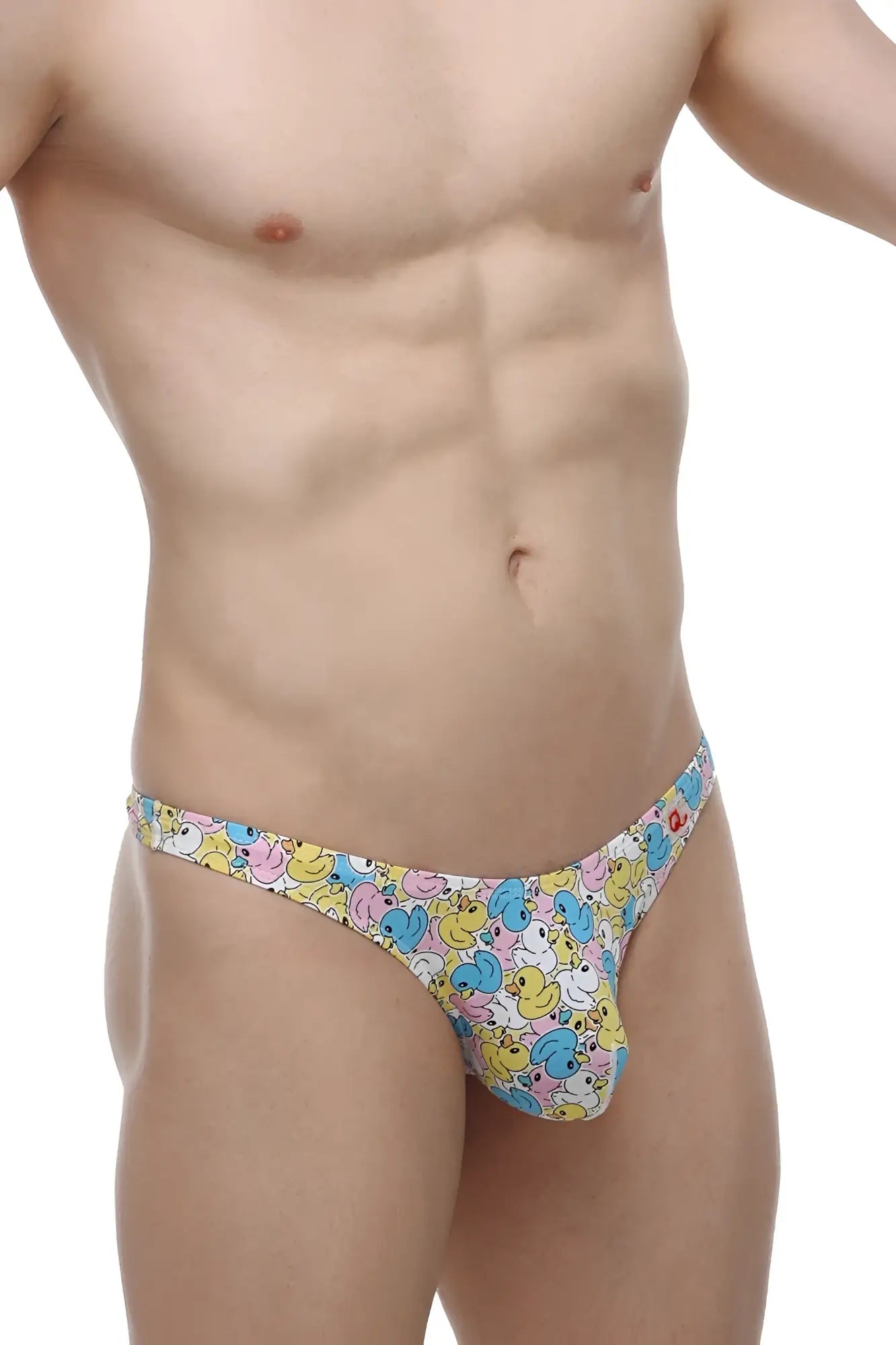 Pastel-colored petitq thong featuring a playful cartoon duck pattern in yellow pink and blue visible from the back side