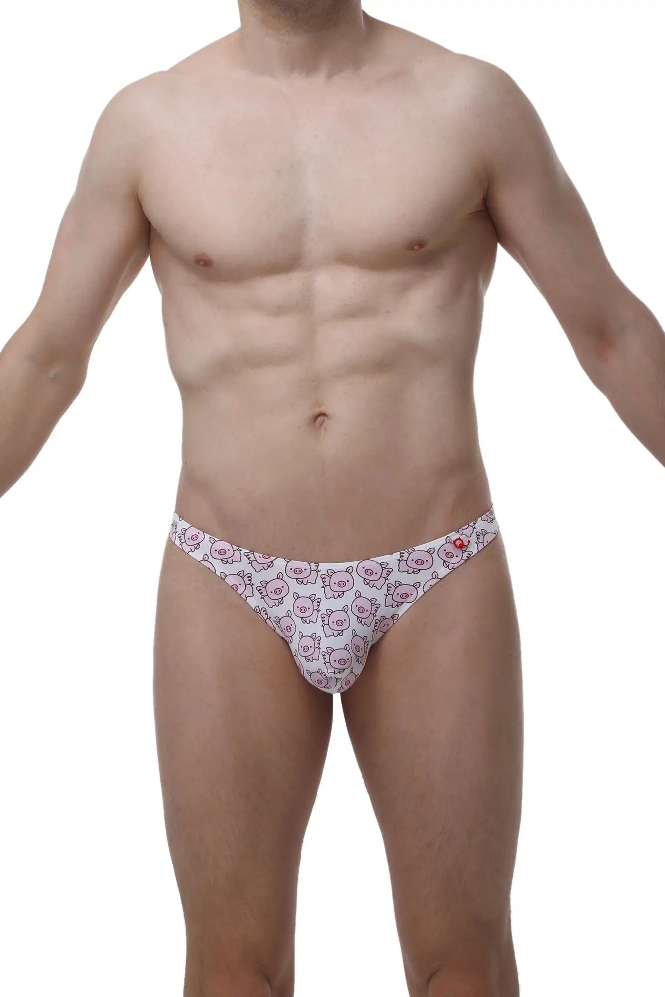 White briefs featuring a repeating pattern of pink cartoon pig faces from PetitQ thong chill piggy love collection
