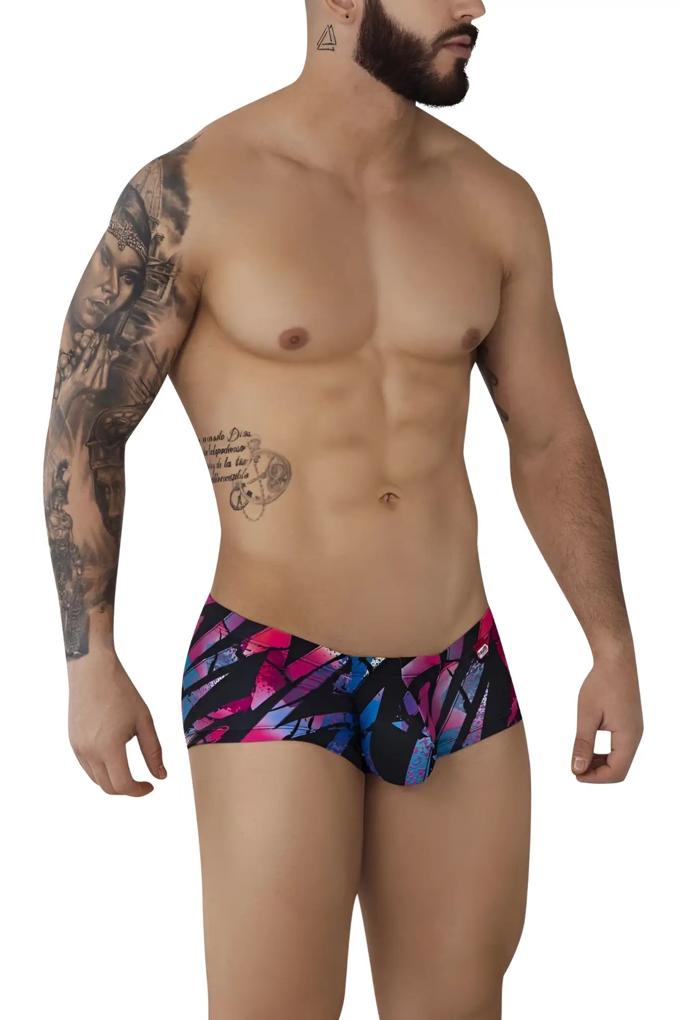 Vibrant pikante pik 0988 jartum swim trunks in bold pink and blue abstract pattern on black background