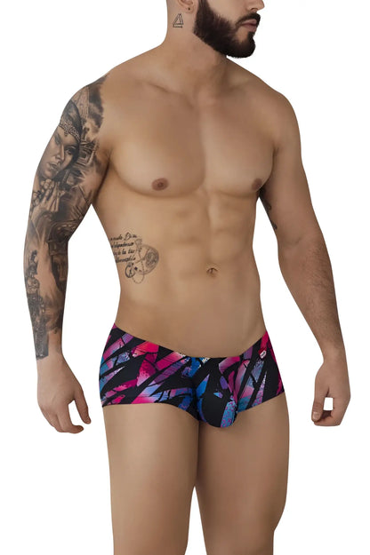 Vibrant pikante pik 0988 jartum swim trunks in bold pink and blue abstract pattern on black background