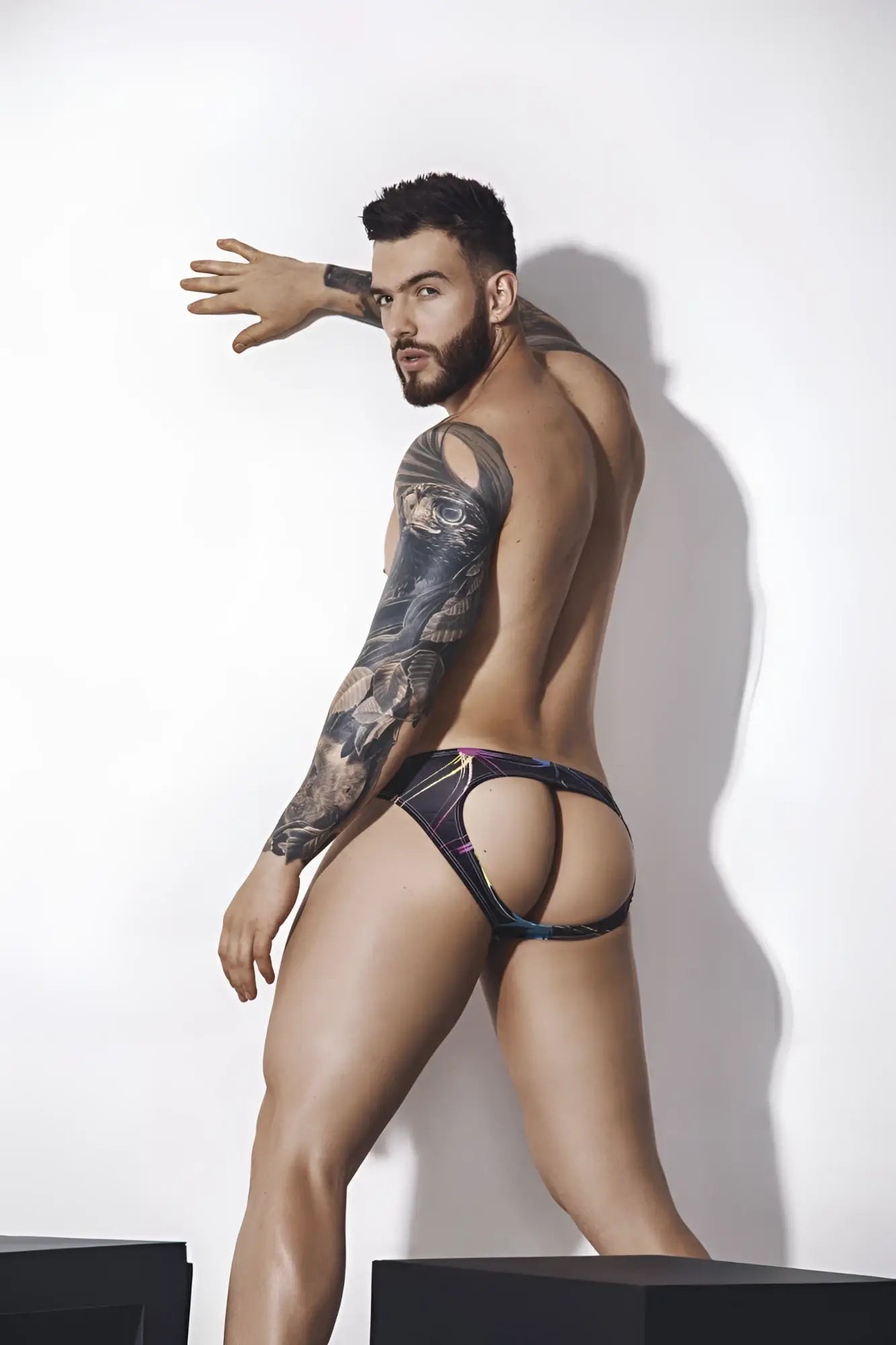 Pikante PIK 1076 nucleus jockstrap in black with purple pattern and cut-out design briefs front view