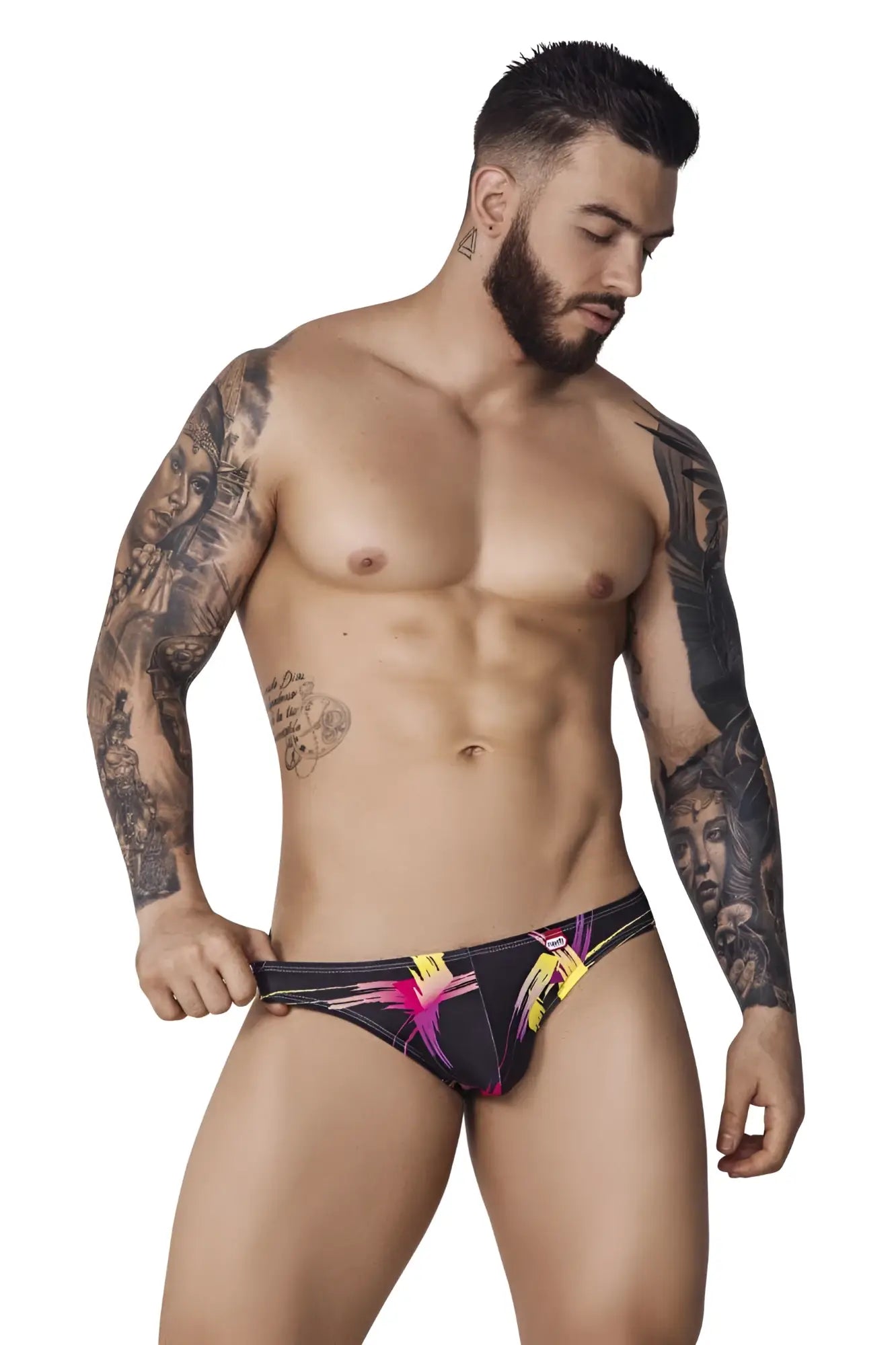Pikante PIK 1076 nucleus jockstrap in black with vibrant pink and yellow abstract designs on swim trunks material