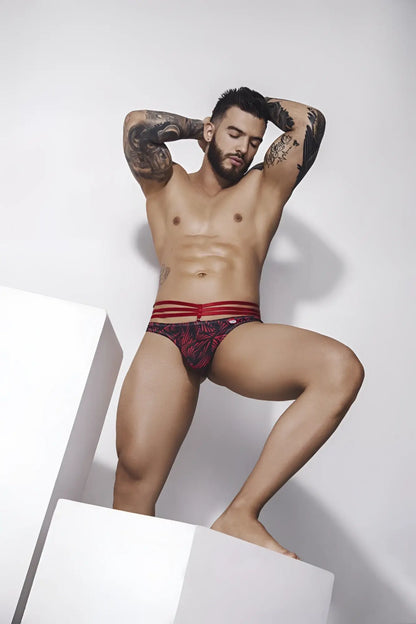 Pikante pik 1081 fiery thongs in red with red and black pattern and three horizontal red stripes on the waistband
