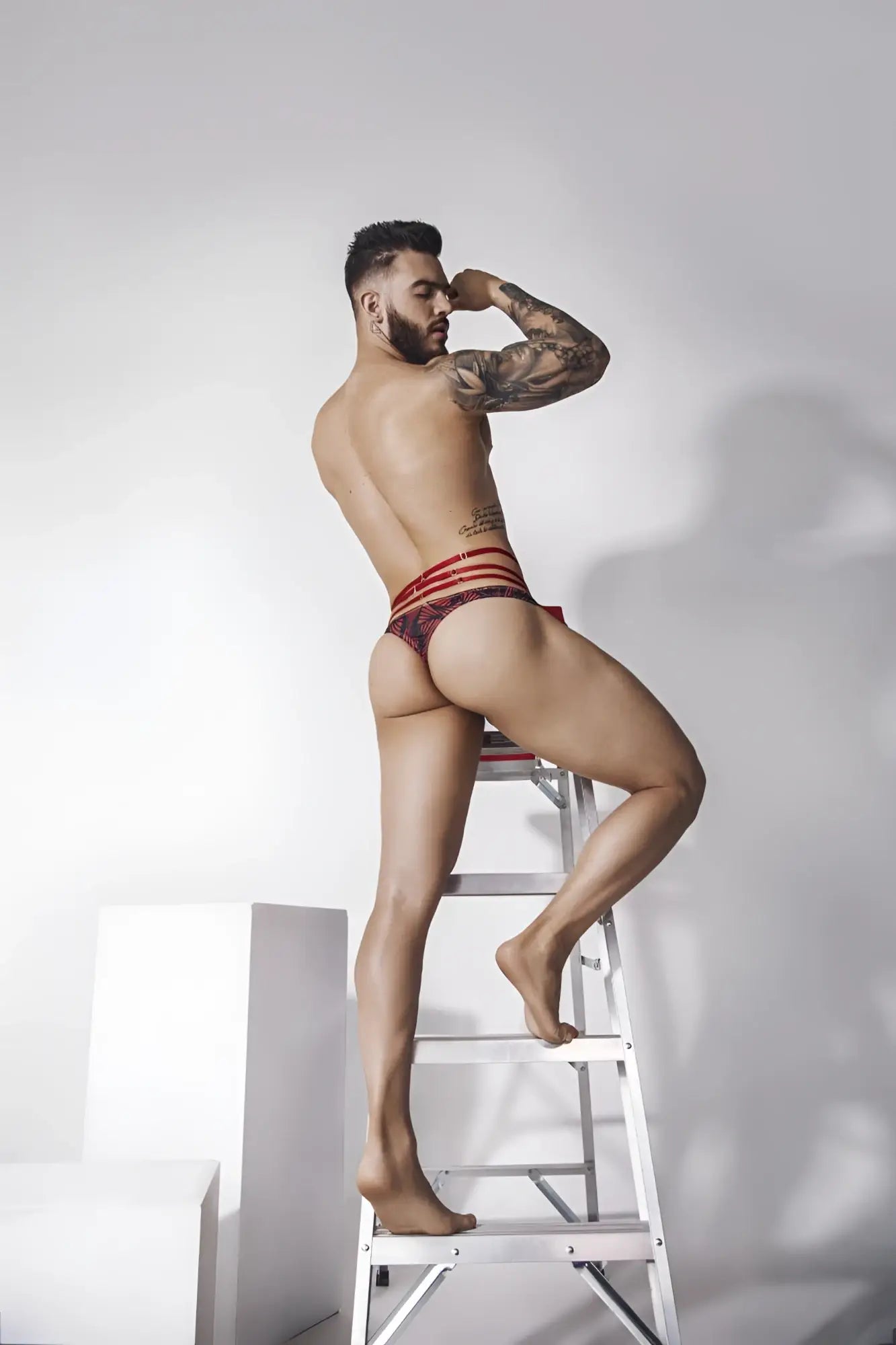 Red and black striped briefs with a patterned design from Pikante PIK 1081 Fiery Thongs collection