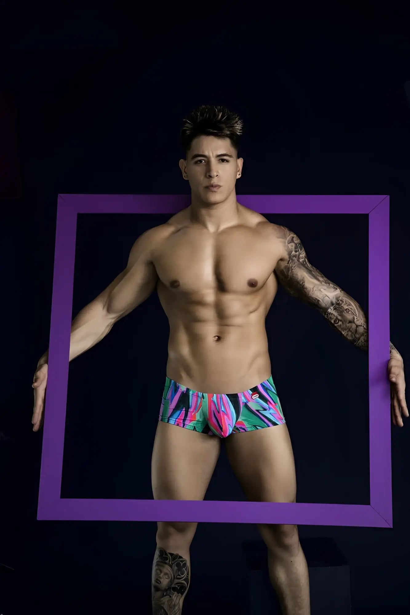 Pikante PIK 1828 abstract trunks in vibrant green with bold multicolored tropical swimwear pattern