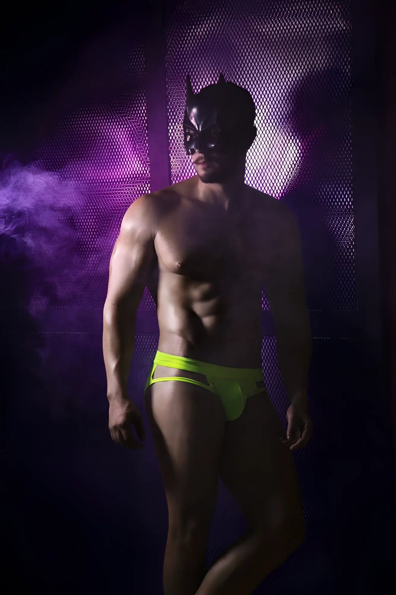 A man wearing a black batman mask and neon green pikante PIK 2114 Lenox briefs showcasing the front view