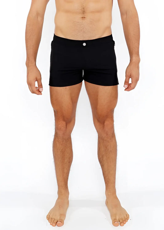 Black pinstripe swim short with a single white button at the waistband made for beach and pool use