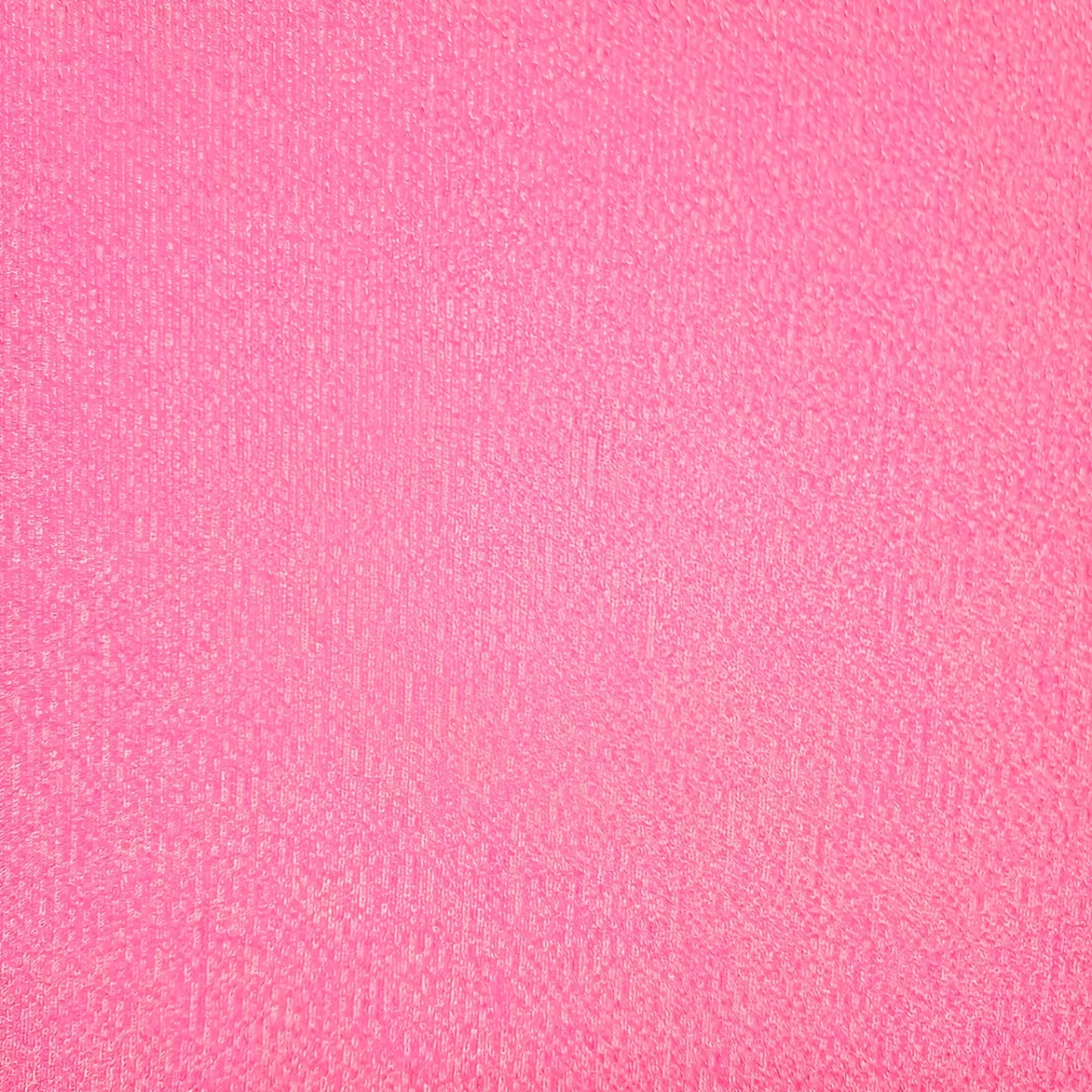 Bright pink pique Speedo swimwear fabric with soft textured woven surface for comfortable water use