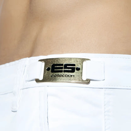 White denim plain cargo shorts with a metallic gold-toned belt buckle featuring black es collection branding