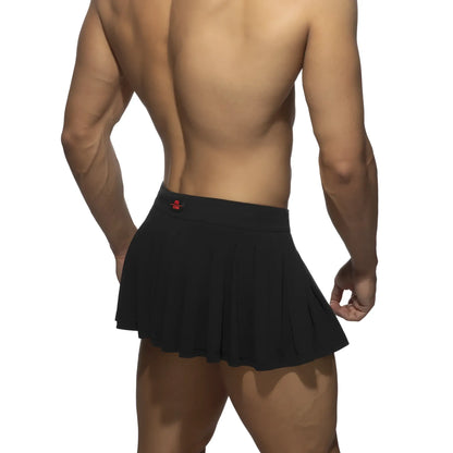 Black pleated ring skirt featuring a red logo on the waistband made from lightweight fabric for stylish wear