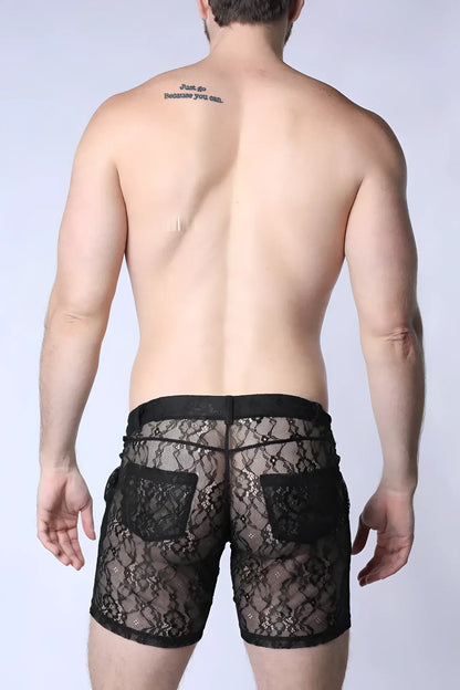 Positano lace shorts featuring black lace with intricate floral patterns and solid black fabric accents on waistband and pockets