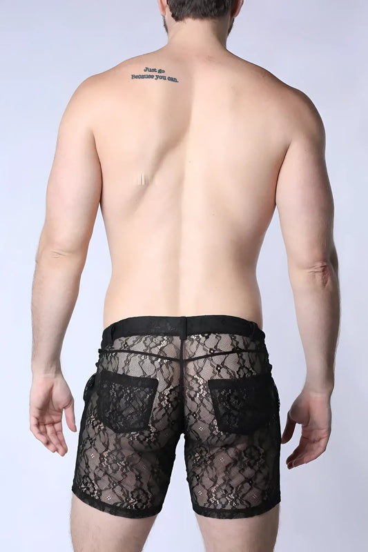 Positano lace shorts featuring black lace with intricate floral patterns and solid black fabric accents on waistband and pockets
