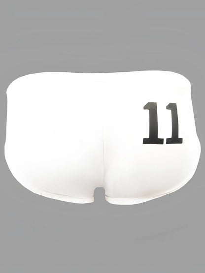 White swim briefs showing the back with black 11 printed on the fabric in pride 11 swim brief design