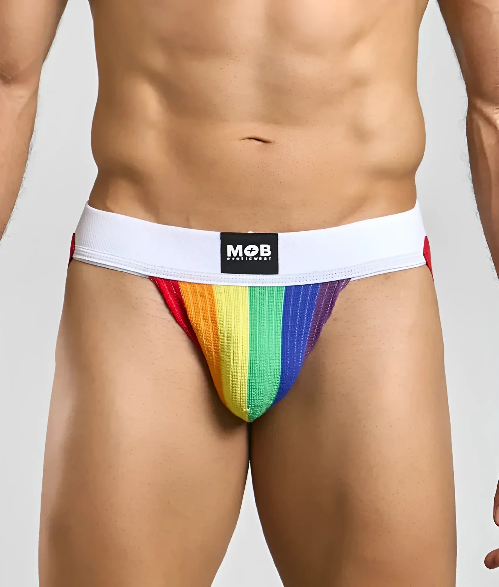 Pride flag colors jockstrap with rainbow stripes and white elastic waistband featuring mob brand logo