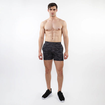 Black printed mesh stretch performance shorts with subtle geometric leaf pattern made from lightweight athletic fabric