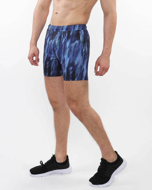 Printed mesh stretch performance shorts in blue and black with an abstract athletic pattern for active wear