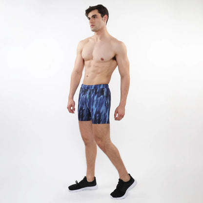 Printed mesh stretch performance shorts in blue tie-dye with a snug fit and elastic waistband for athletic use