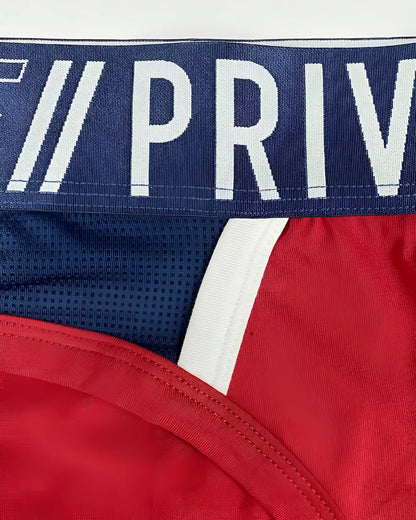 Navy blue and red Private Structure BAUT4388 athlete mini briefs with white trim and priv logo waistband