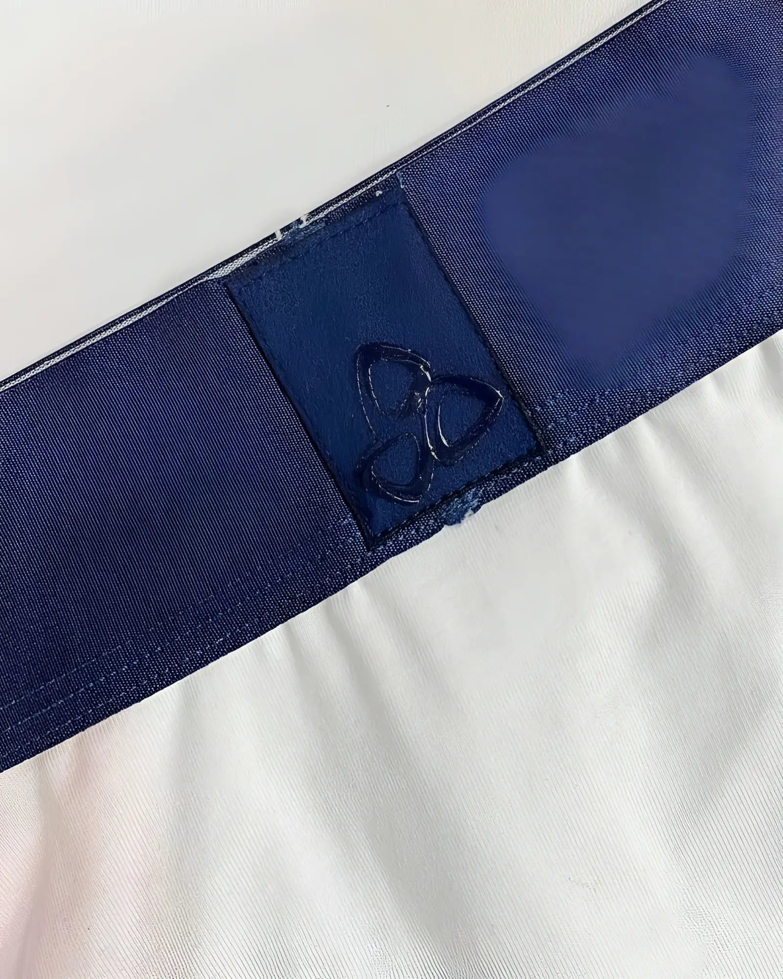 Private structure bauth4388 athlete mini briefs in white league featuring a dark blue elastic waistband with embroidered logo patch