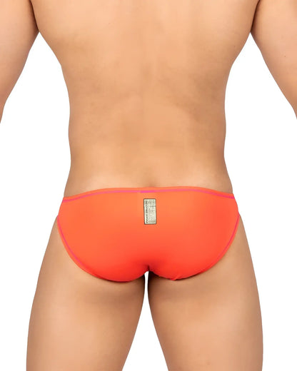 Back view of private structure epus4563 prime eutopia vibrant orange swim trunks with subtle pink trim and label