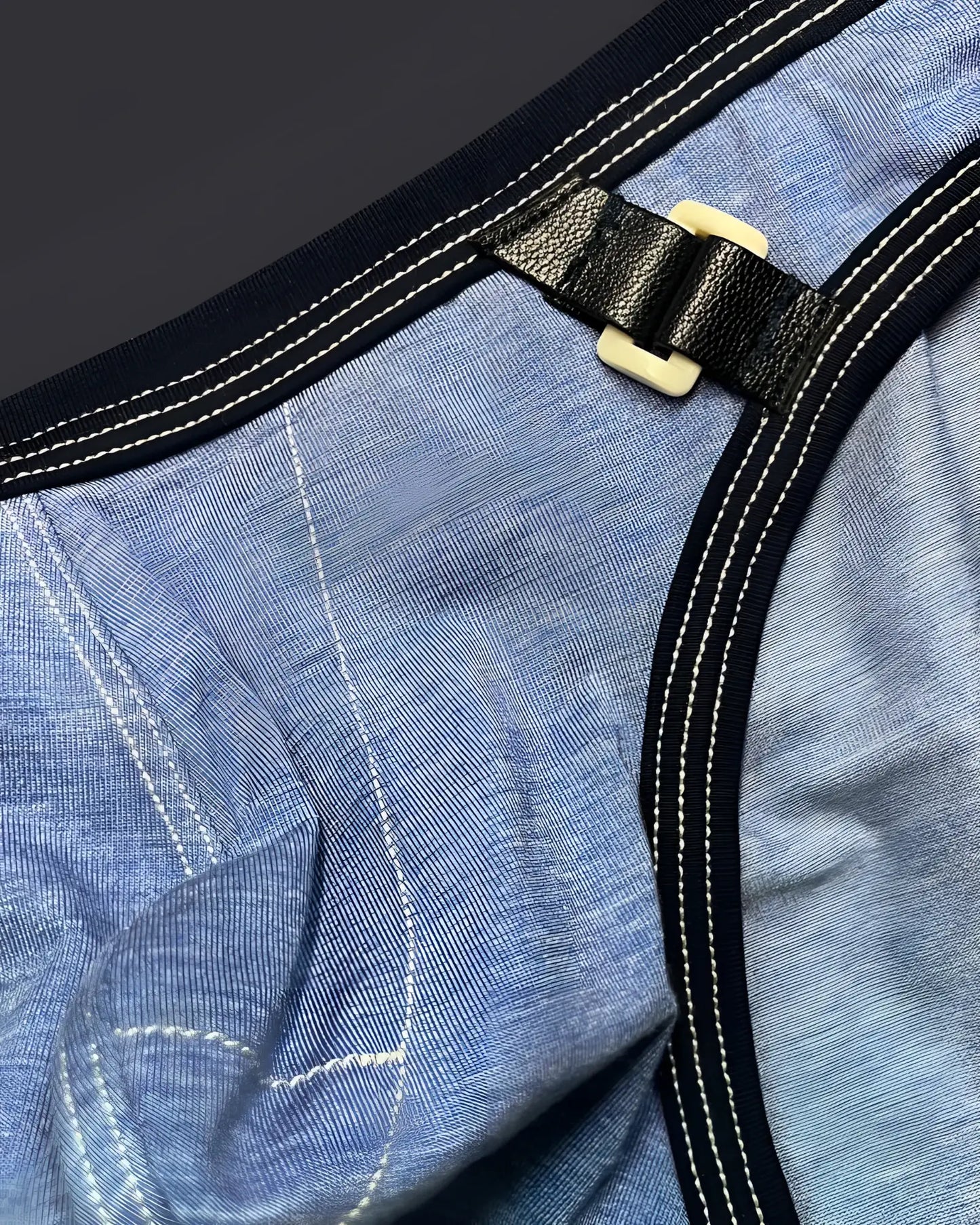 Private structure lcut4358 barn boy low rise mini brief denim with black leather strap and cream plastic buckle on blue denim