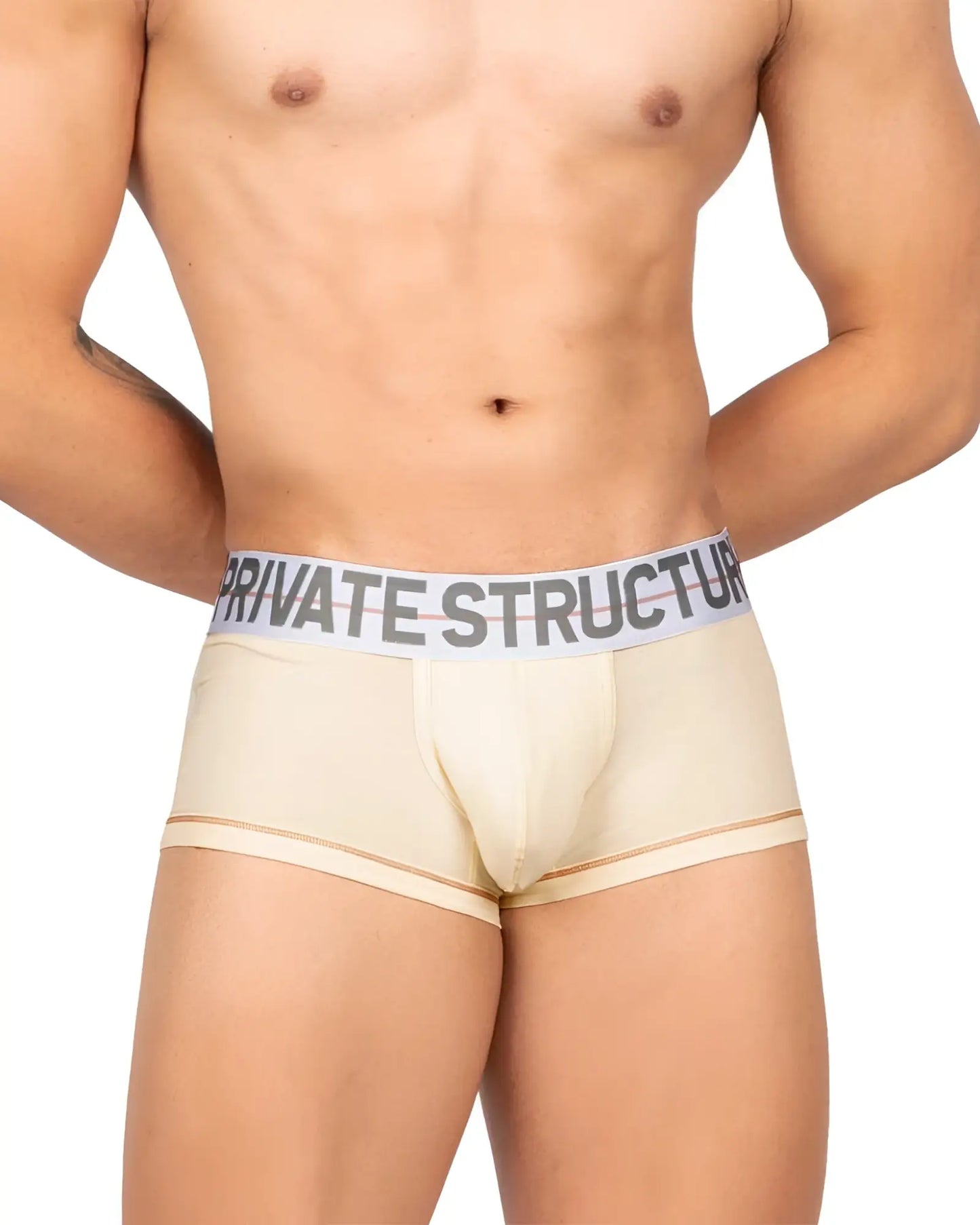 Cream-colored men’s boxer briefs with a white elastic waistband and private structure brand name in bold black letters