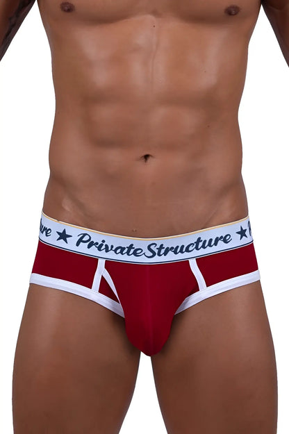 Red men’s briefs with white trim and private structure waistband featuring black lettering and star motifs