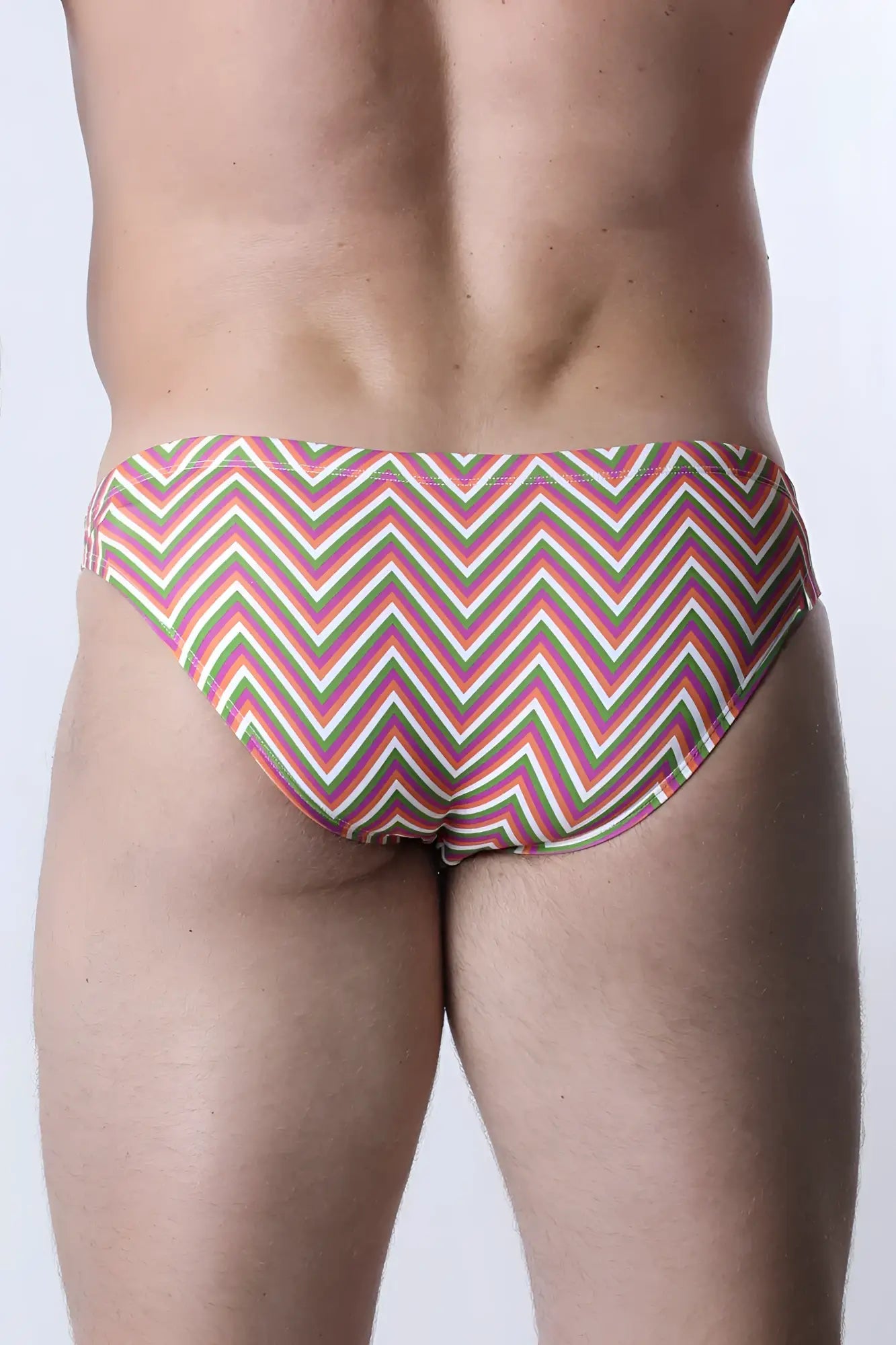 Pulse swim brief vibrant zigzag-patterned swim trunks in pink green and cream perfect for beachwear