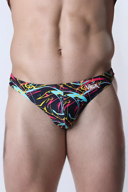 Vaux pulse swim thong in neon pink yellow and cyan abstract pattern on black fabric for men