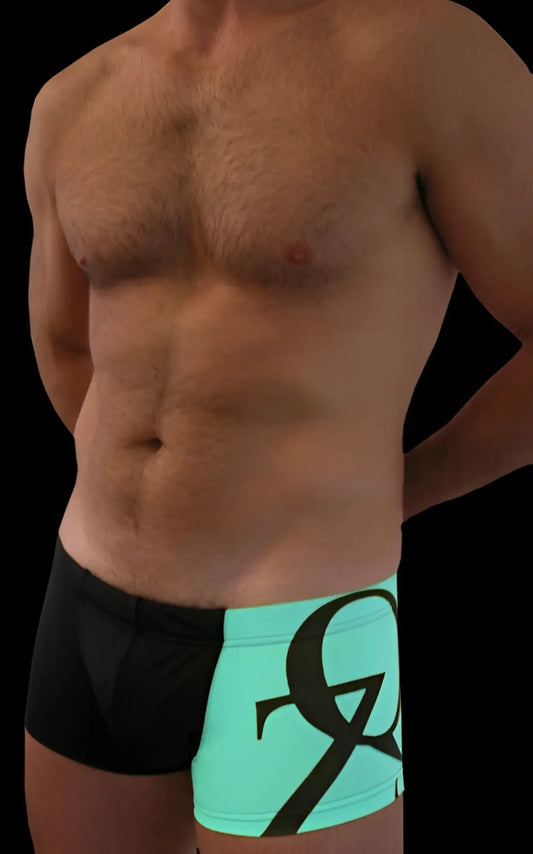 Black and neon green qz bodywear square cut swim trunks with bold black front graphic in size medium