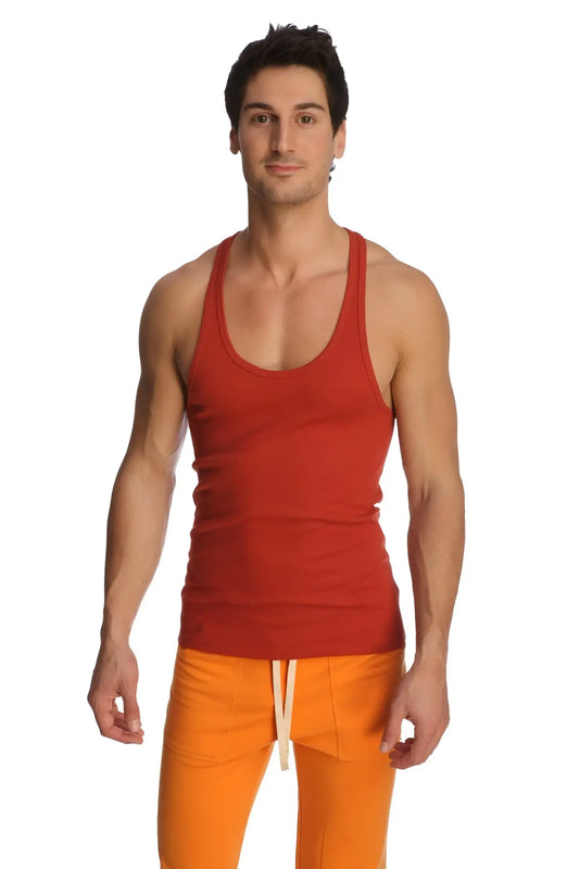 Red ribbed racer-back yoga tank in cinnabar with scoop neckline and straight hem for activewear use