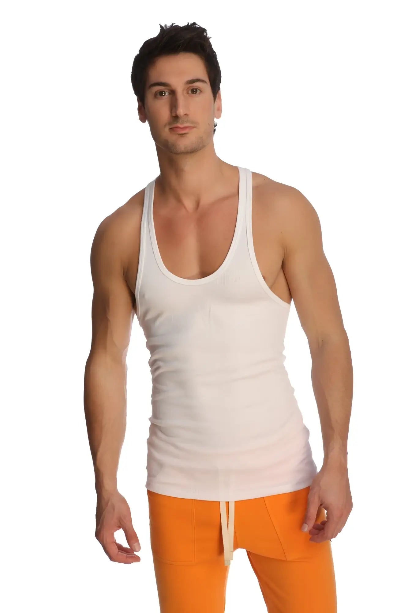 White cotton racer-back yoga tank with scoop neckline and thin shoulder straps for comfortable workouts
