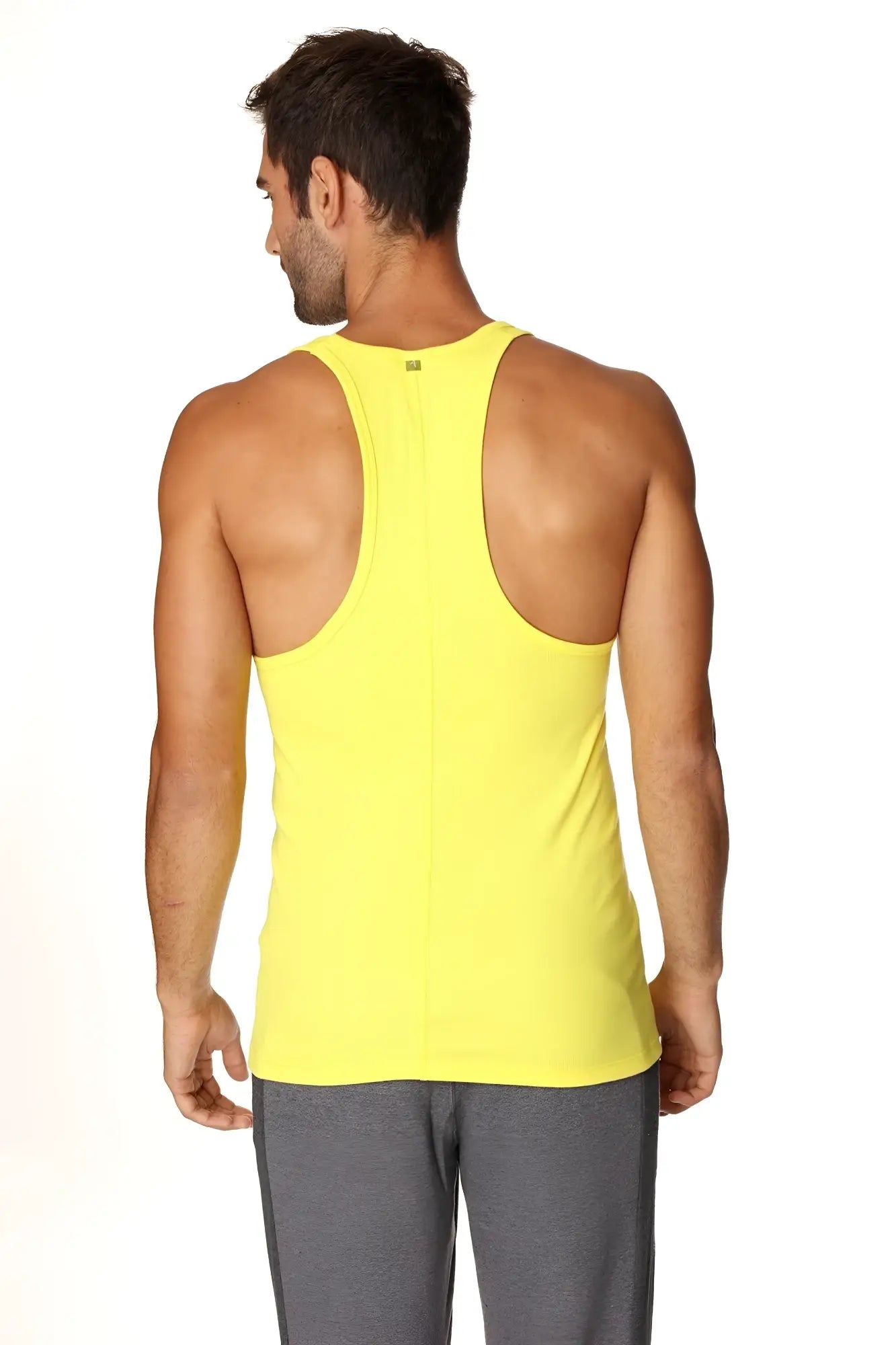 Bright yellow racerback yoga tank top with sleek form-fitting design ideal for active wear