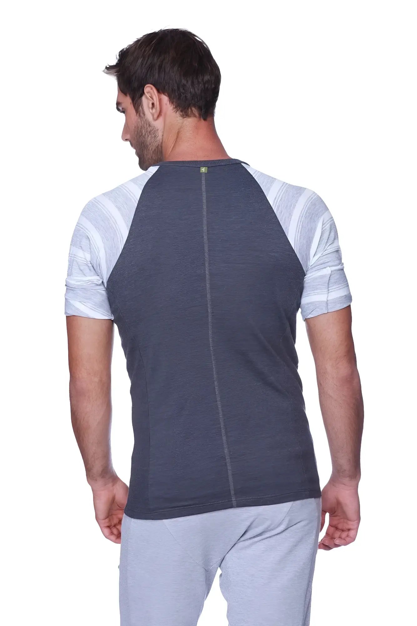 Back view of raglan virtual crew neck charcoal with grey and white striped raglan sleeve t-shirt with central zipper