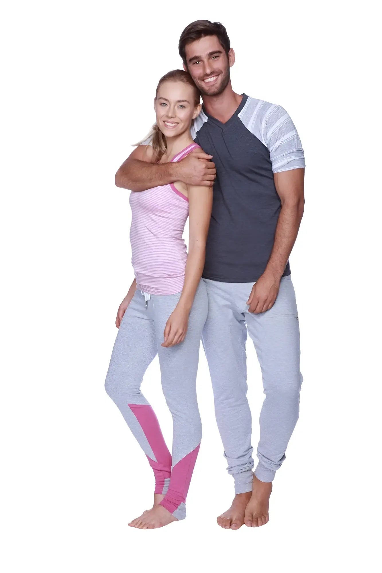 A pair of light gray athletic leggings with vibrant pink panels along the outer thighs and lower legs for activewear