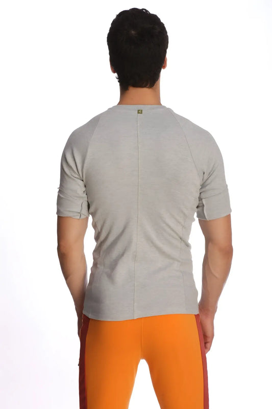 Back view of raglan virtual crew neck gray heathered short-sleeved athletic shirt with central seam