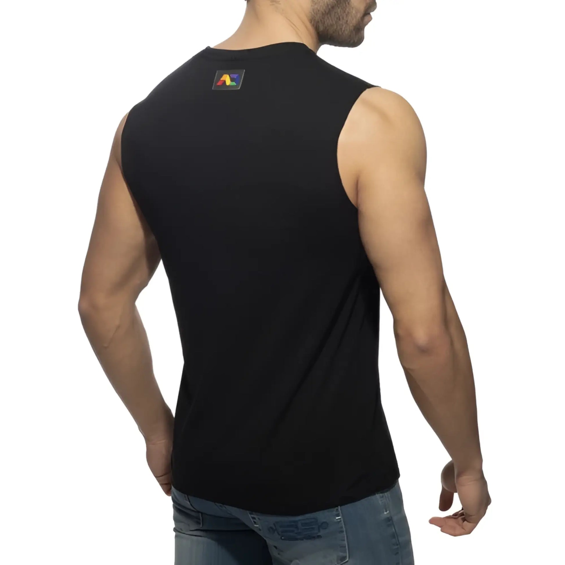 Black sleeveless tank top with a small colorful logo patch on the upper back showing the back side of the rainbow tape tank top