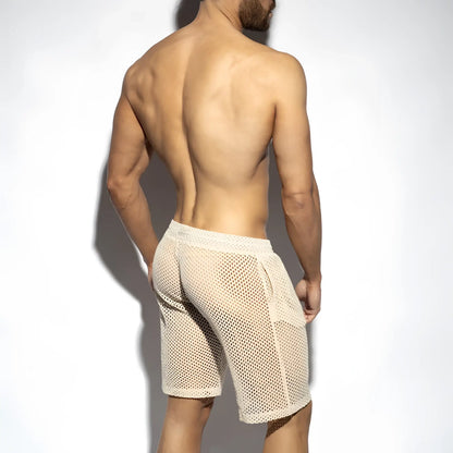 Beige raw crochet bermudas with mesh fabric, solid waistband, and side pockets for casual wear