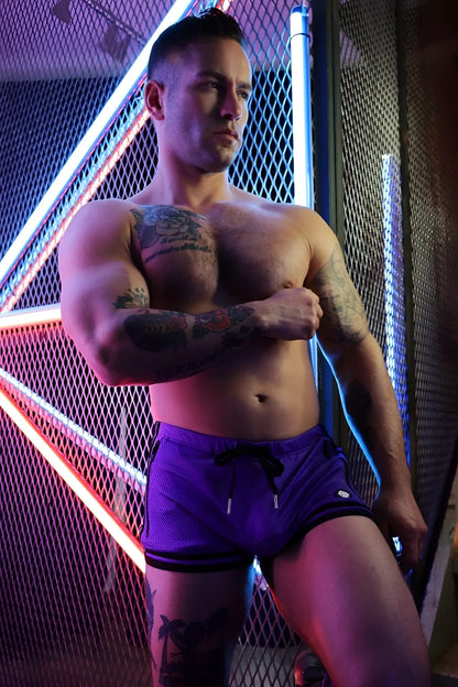 Purple remix circuit shorts 2.0 with black trim and drawstring waistband designed for athletic performance