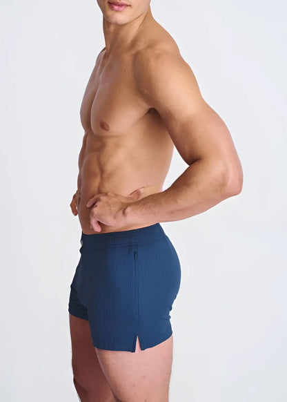 Navy blue ribbed riviera seersucker swim shorts with side zipper split hem and mesh lining for athletic use