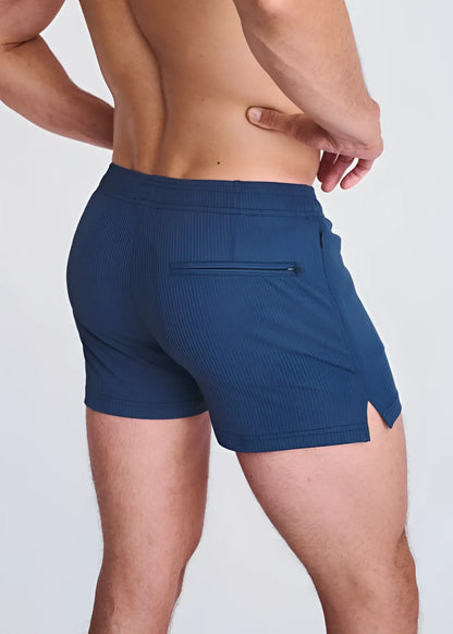 Navy blue riviera seersucker swim shorts with mesh lining textured fabric side zip pocket and hem cutout