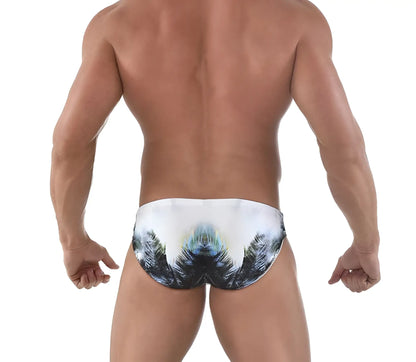 White swim trunks with symmetrical black green and blue tropical palm tree print by roberto lucca size 2xl