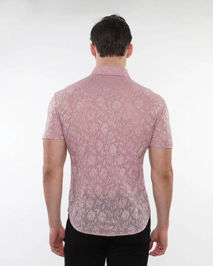 A pink short sleeved roses leaves gossamer knit shirt with a subtle floral lace pattern and button up front