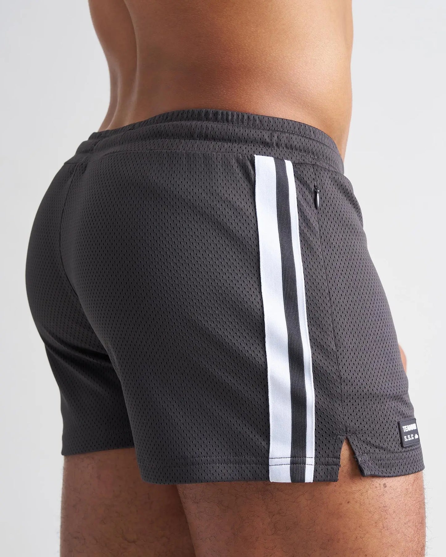 Dark gray s.s.c. fraternity 3 mesh shorts with bold white side stripes and black brand tag at the hem